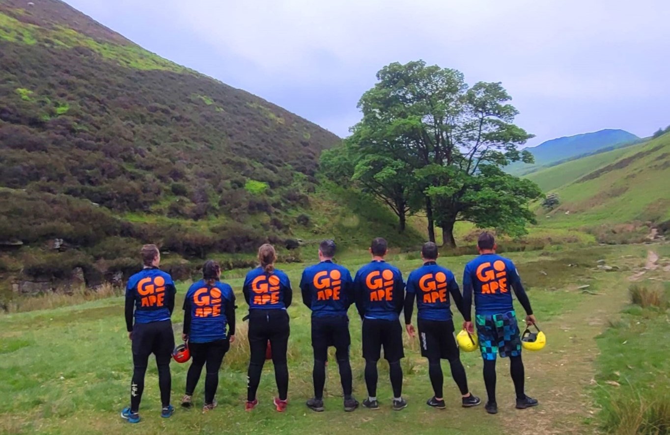 Go_Ape_Team_in_uniform_by_peak_district_mountains