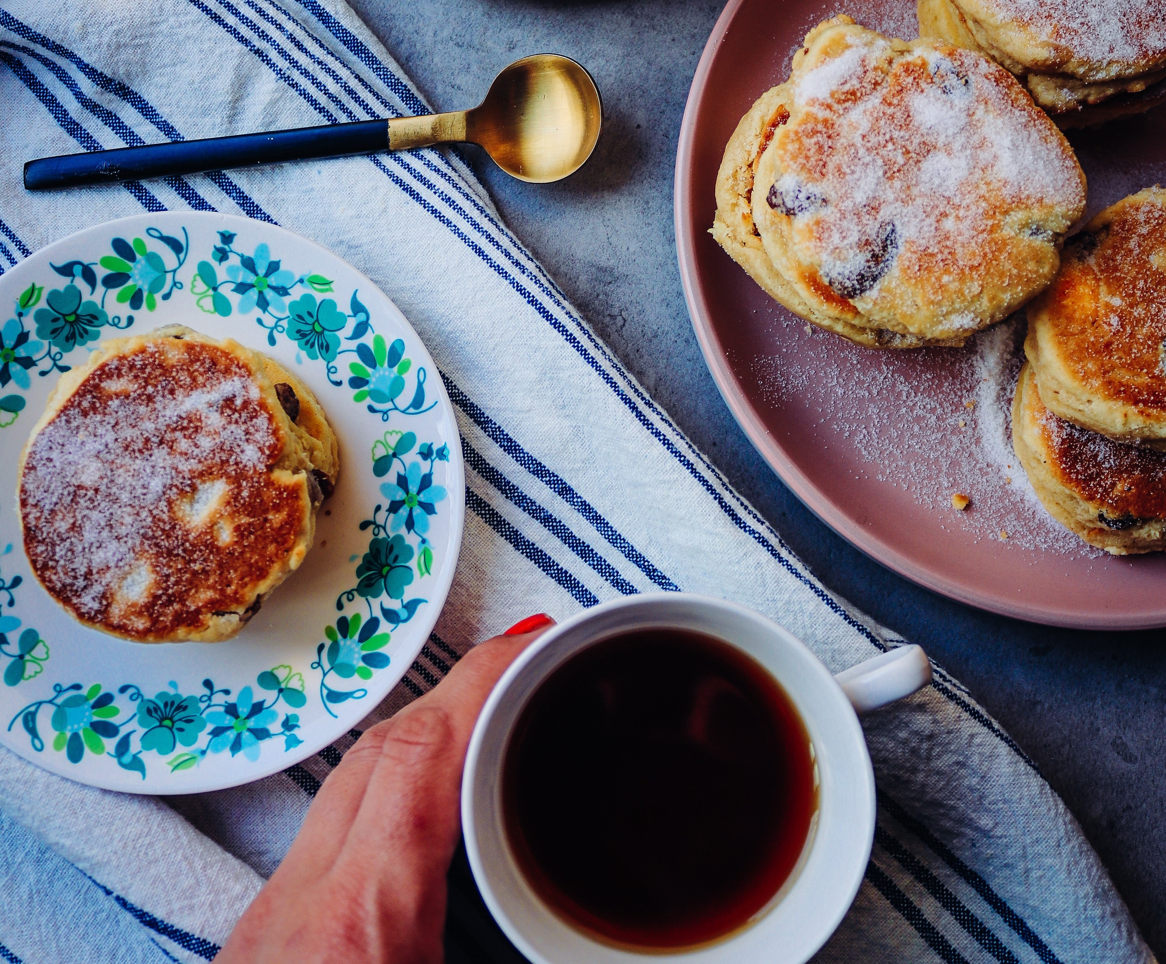 Plate of welsh cakes and cup of tea  