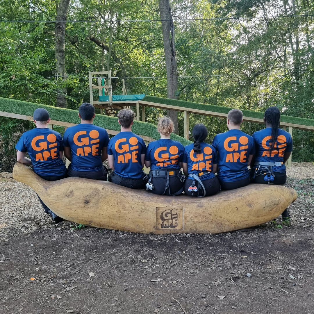 Go Ape Chelmsford team sitting on the Banana Bench 