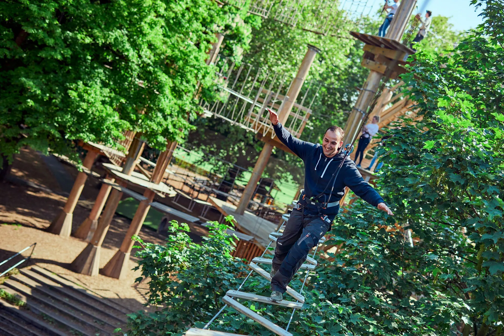 Person on a high ropes course.