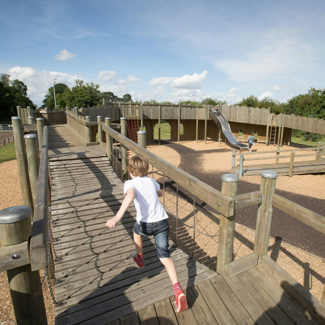 Children explore the fort themed play area on the Hylands Estate
