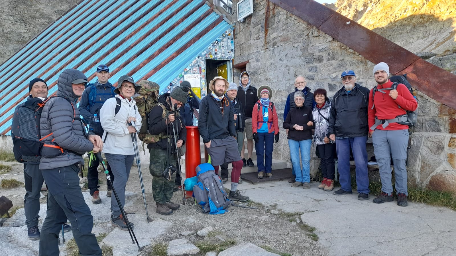 The TEN Trek Musala team beside their mountain hut for the night in the high Rila Mountains