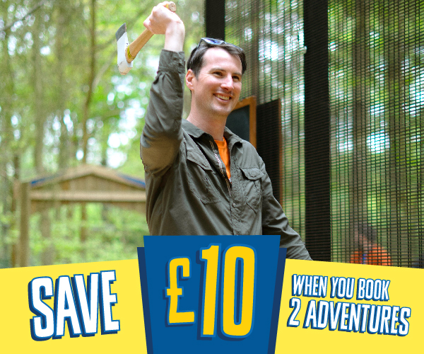 A man prepares to launch an axe at a target in the forest with the text save 10 pounds when you book two adventures