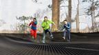 Man and two boys on Go Ape Nets Adventures