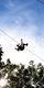 Silhouette_of_a_person_on_a_zipline