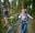 A woman on a Go Ape high ropes crossing on a day out near Blackburn