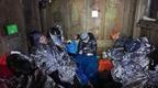 Runners sleeping in bothy  