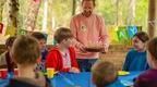 Birthday party group in Go Ape Shelter with Birthday Cake 