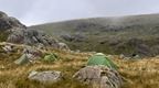 Camping in tents on a hill in the Lake District