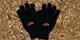 go ape black gloves on bed of wood chip 