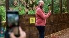 A man preparing to throw an axe on a Go Ape team day