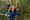 A girl in a blue top on a Go Ape course having fun on a half term adventure