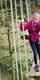 Young girl in pink on Go Ape Grizedale Treetop Adventure 