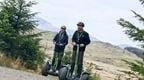 To men enjoying a Go Ape Forest Segway experience on a fun stag do