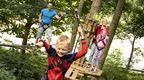 A family on a treetop adventure making the most of their Go Ape annual pass