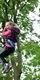 Young girl on Go Ape Treetop Adventure zip