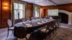 A conference room with period features and modern facilities at Coombe Abbey Hotel in the Midlands